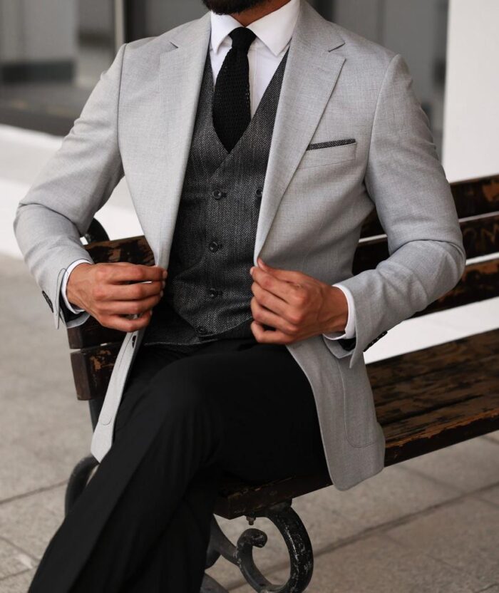 Sowerby Street <p>Slim fit light grey and black mixed combined three piece suit with herringbone waistcoat</p>
