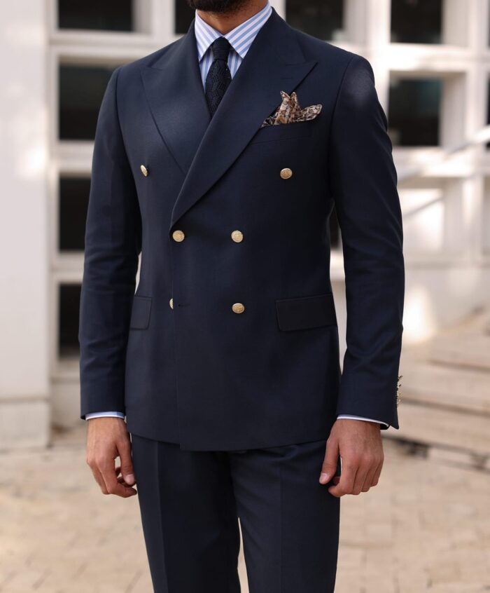 Calverley Walk Slim fit dark navy blue double breasted two piece men's suit with gold buttons and peak lapels