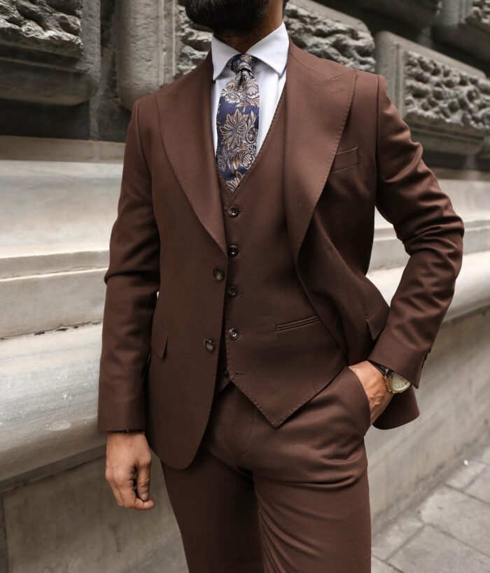 King's Road <p>Slim fit chocolate brown three piece men’s suit with peak lapels</p>
