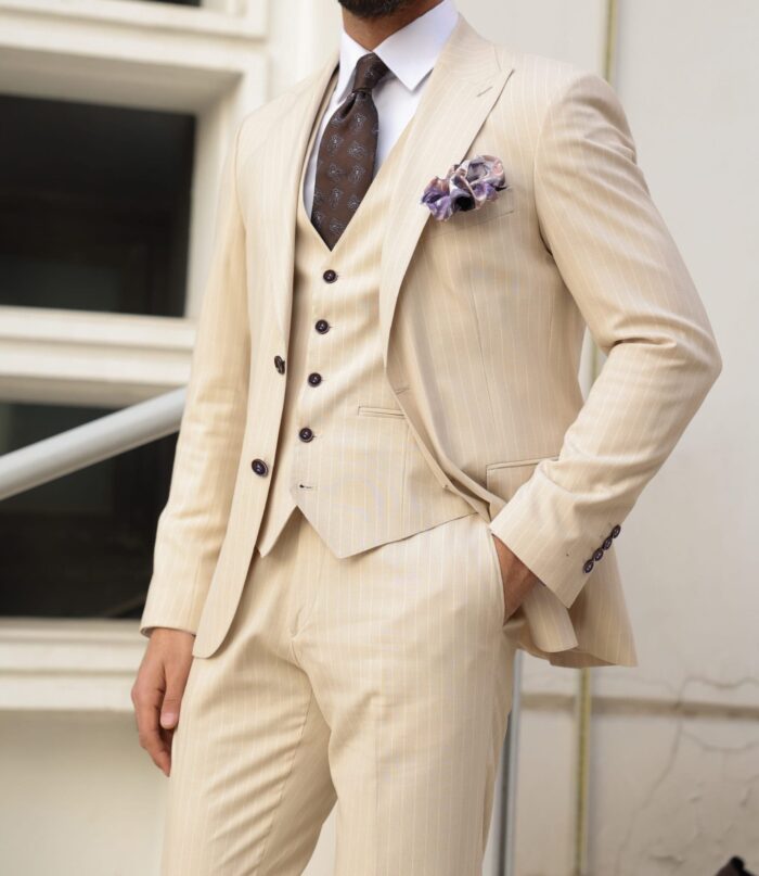 Spitalfields Slim fit all cream pinstriped men’s three piece suit with peak lapels