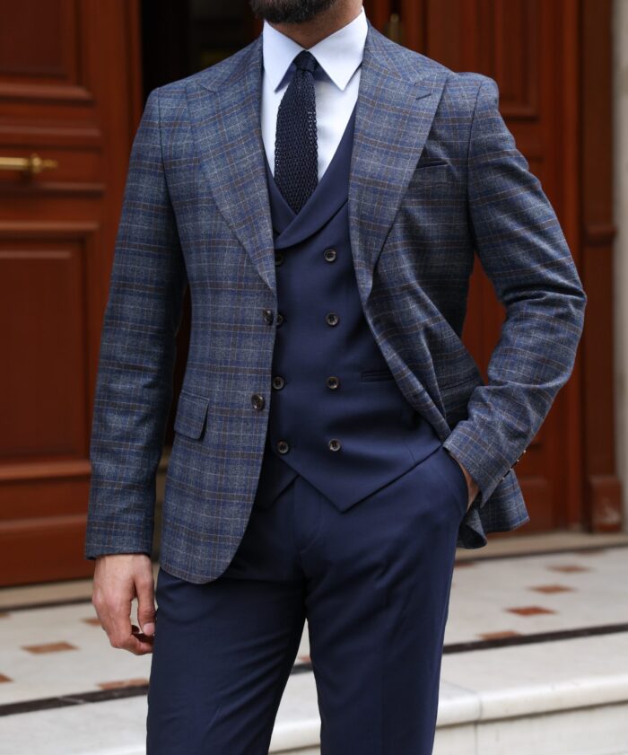 County Street Slim fit dark blue chequered mixed three piece suit with a double breasted waistcoat and peak lapels