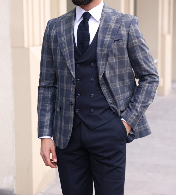Darling Road <p>Slim fit light navy blue chequered mixed three piece suit with a double breasted waistcoat and peak lapels</p>
