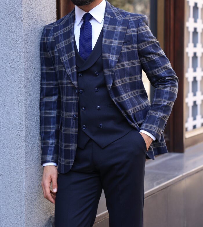 Keyse Road Slim fit dark blue chequered mixed three piece suit with a double breasted waistcoat and peak lapels
