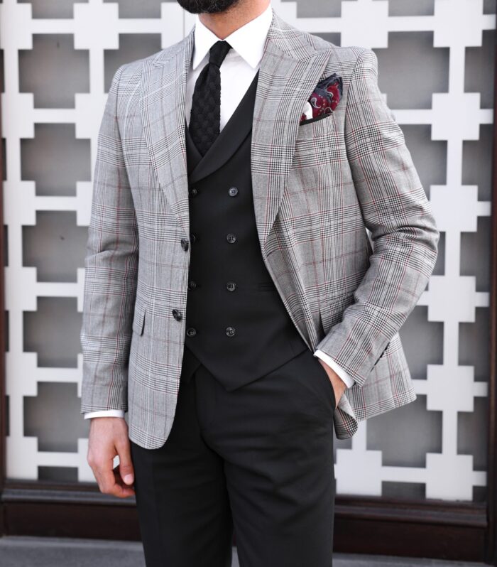 Daniel Gardens Slim fit light grey and black chequered mixed three piece suit with a double breasted waistcoat and peak lapels