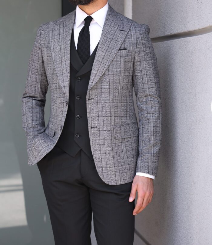 Harden's Manorway Slim fit light grey and black chequered mixed three piece suit with a double breasted waistcoat and peak lapels