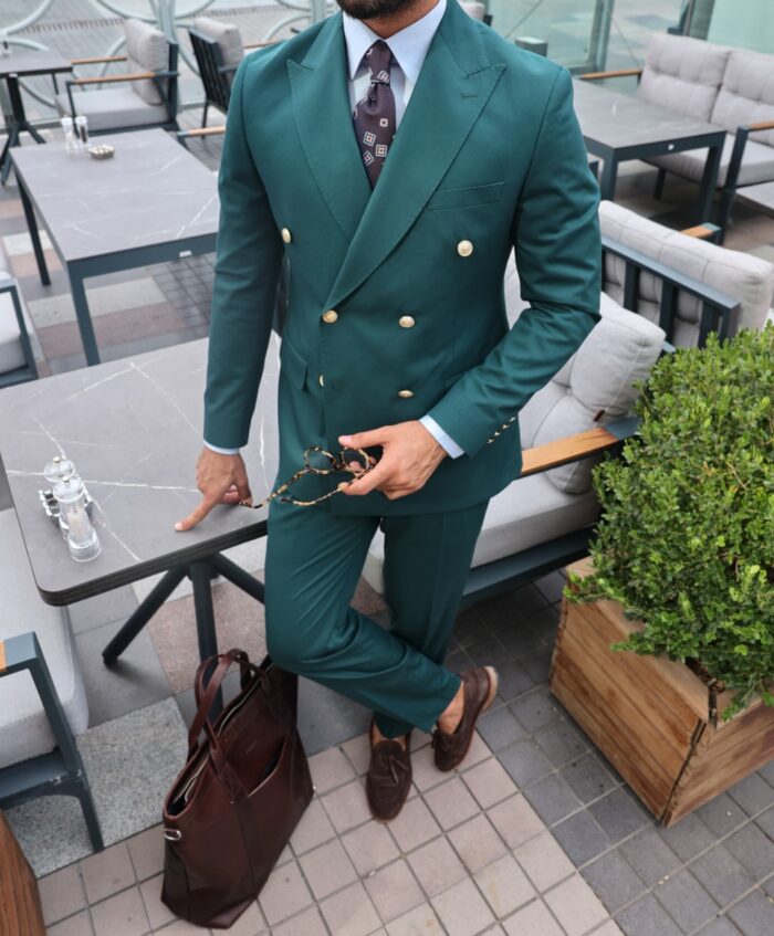 Cottons End Tailored slim fit pine green double breasted men's suit with decorative gold buttons and peak lapels