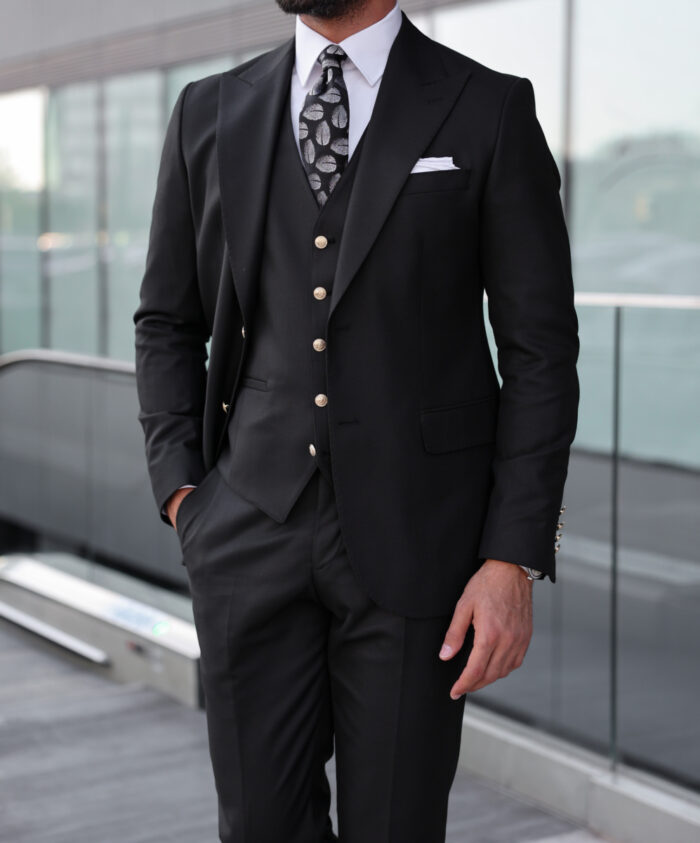 Edmonton SLIM FIT BLACK THREE PIECE MEN’S SUIT WITH PEAK LAPELS WITH decorative gold buttons.