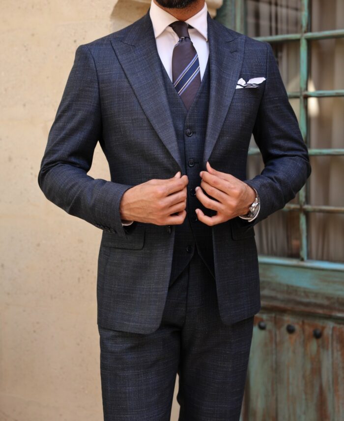 Orange Hill Road Slim fit navy men’s three piece suit with very fine blue checked lines peak lapels