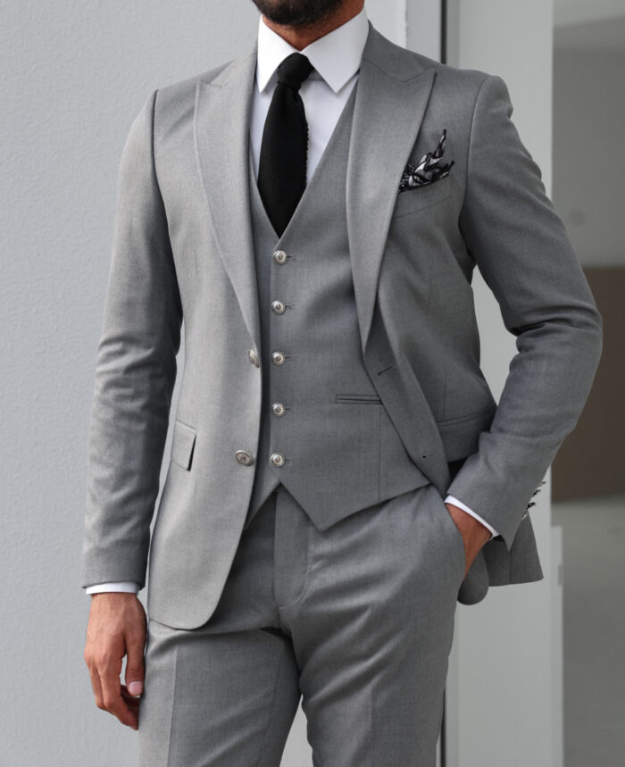 Sanders Close Slim fit mid grey men’s three piece suit with peak lapels and with decorative silver buttons