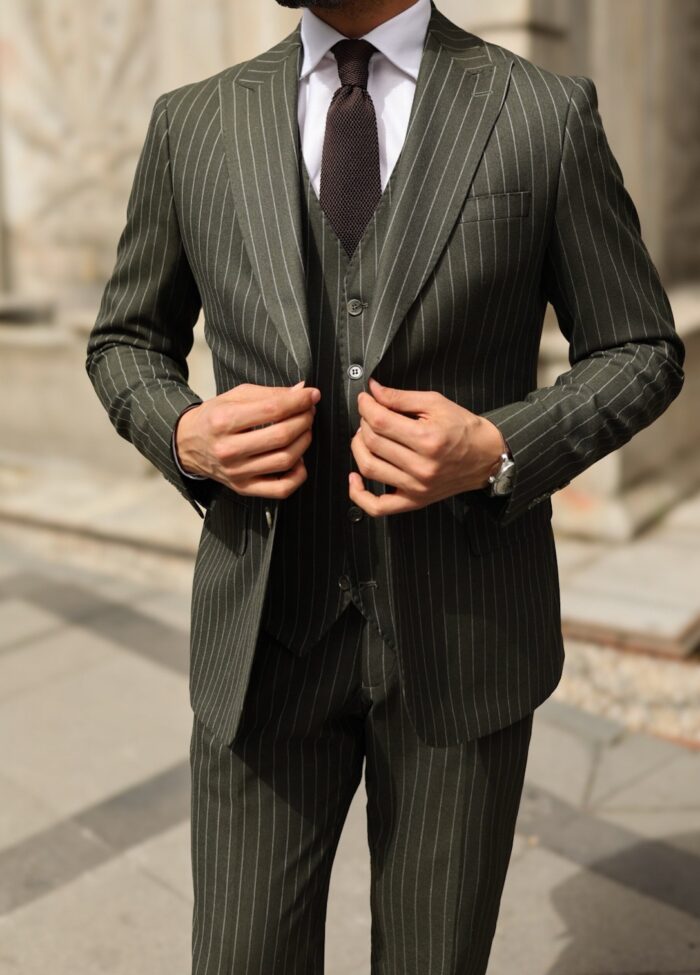 Hook End Road Tailored slim fit olive green three piece pinstripe men's suit with peak lapels