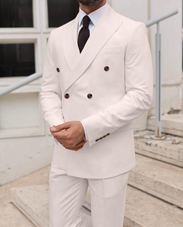Leon Street Tailored slim fit cream double breasted men's suit with peak lapels