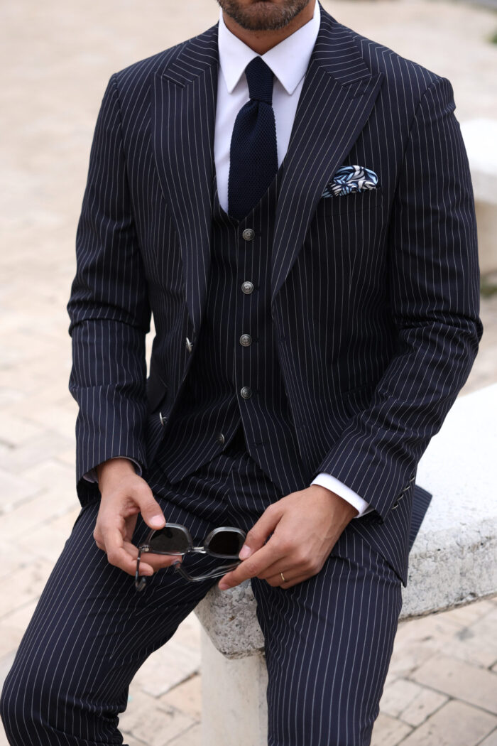 The Plain Slim fit dark blue men’s three piece suit with peak lapels and with decorative silver buttons