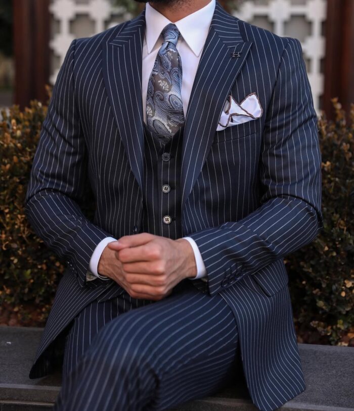 Bonnie Road Slim fit dark navy pinstripe men’s three piece suit with peak lapels