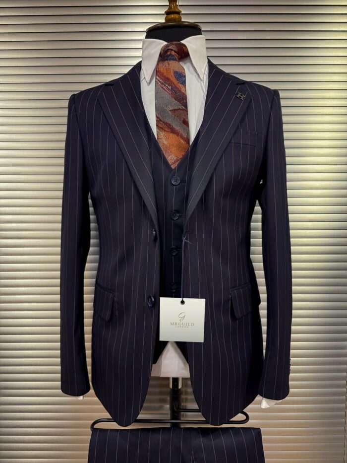 Vine Hill Slim fit dark navy pinstripe men’s three piece suit with peak lapels