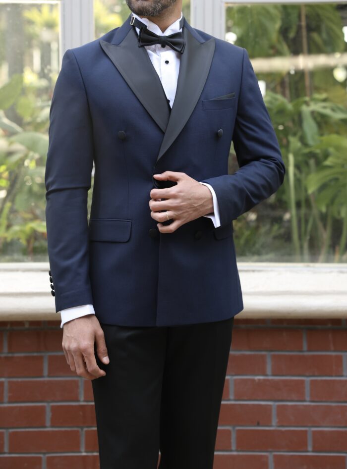 Globe Terrace Tailored slim fit blue double breasted men’s tuxedo with black satin peak lapels