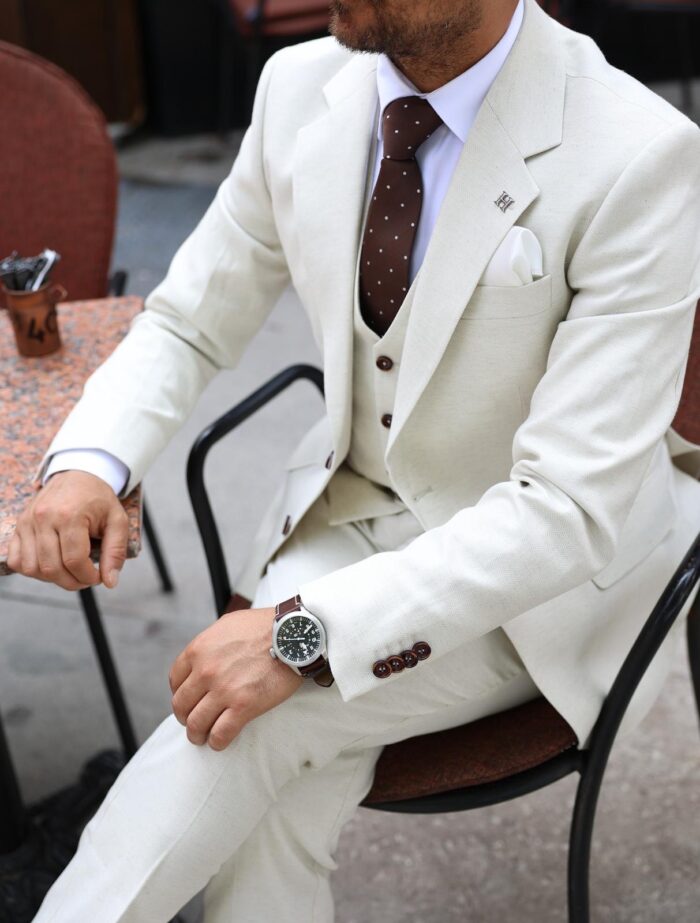 Clore Lane Slim fit cream herringbone men’s three piece suit with notch lapels