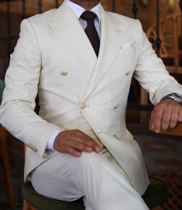 Rudd Street Tailored slim fit cream double breasted pin striped men’s suit with peak lapels with decorative gold buttons