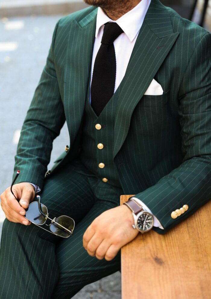 Gorleston Mews Slim fit green men’s three piece suit with peak lapels and with decorative gold buttons