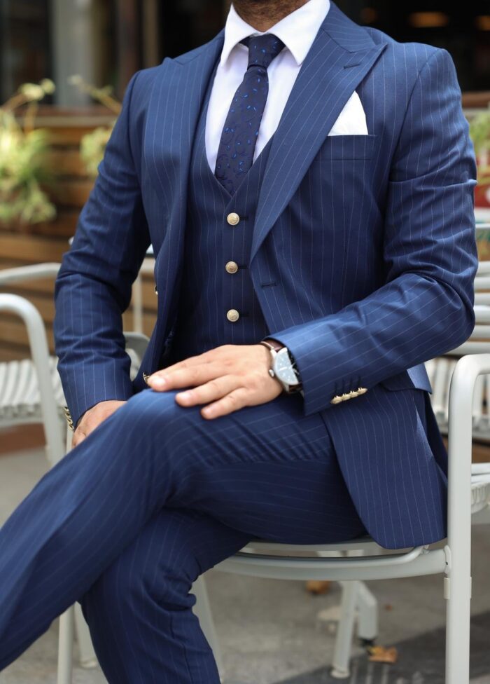 Erindale Street Slim fit navy blue men’s three piece suit with peak lapels and with decorative gold buttons

