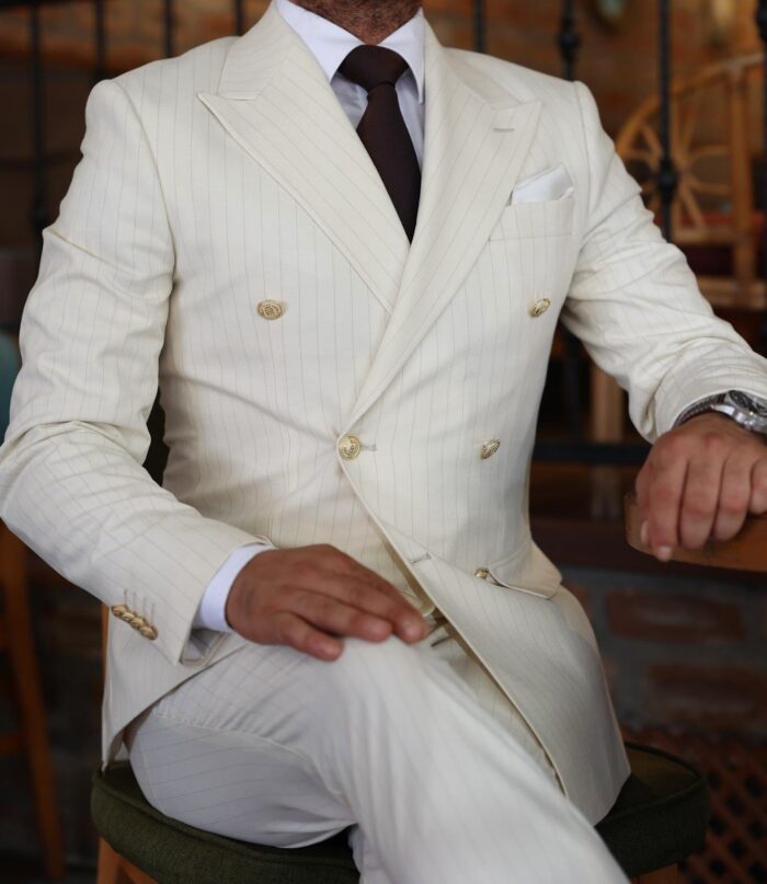 Rudd Street Tailored slim fit cream double breasted pin striped men’s suit with peak lapels with decorative gold buttons