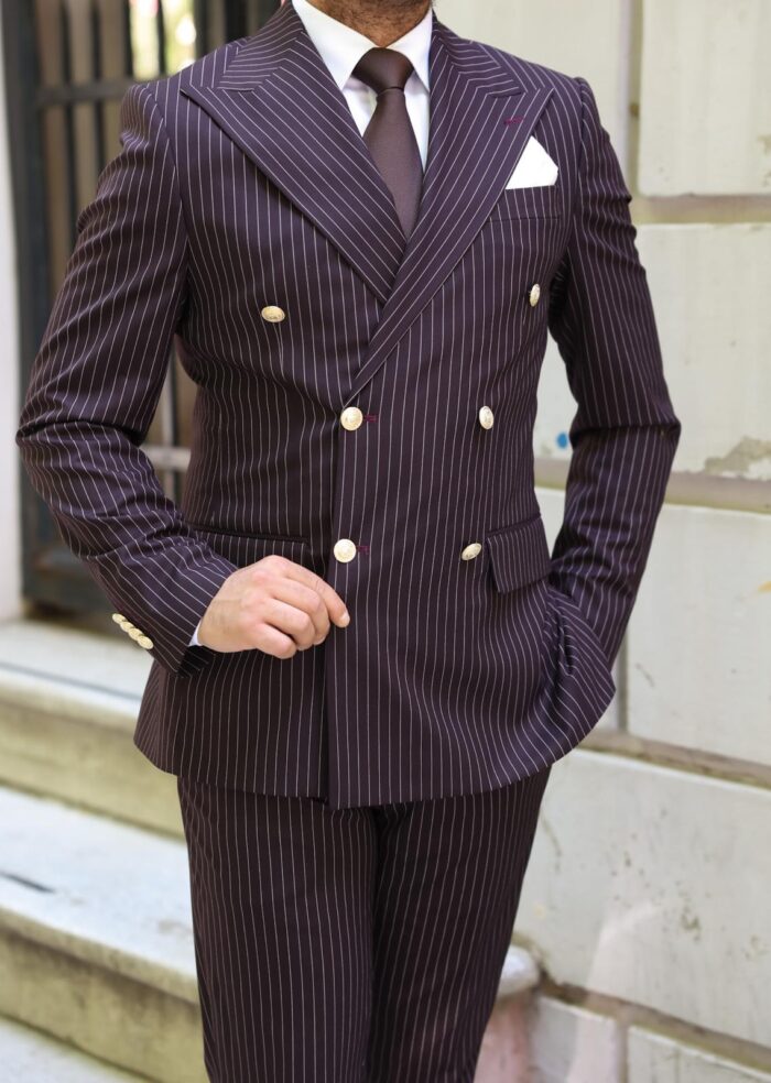 Martel Place Tailored slim fit burgundy double breasted pin striped men’s suit with peak lapels with decorative gold buttons