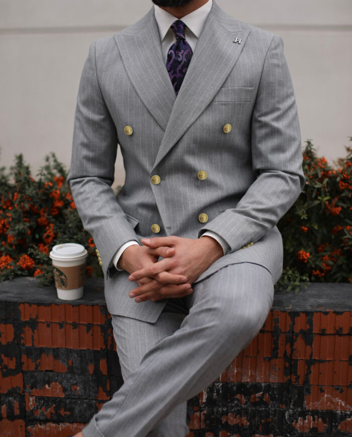 Askew Buildings Tailored slim fit grey double breasted pin striped men’s suit with peak lapels with decorative gold buttons