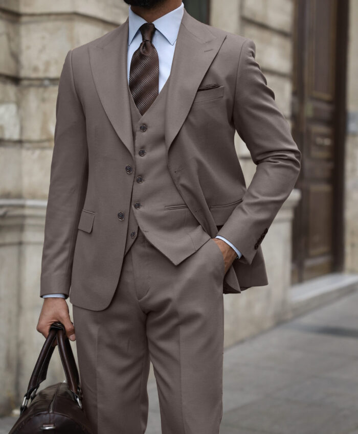 Gilkes Crescent Slim fit taupe three piece men’s suit with peak lapels