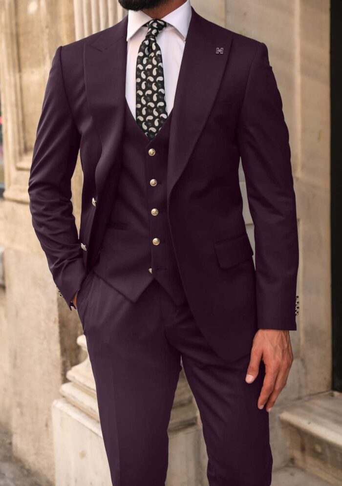 Dunmaston Mews Slim fit burgundy plum men’s three piece suit with decorative gold buttons and peak lapels
