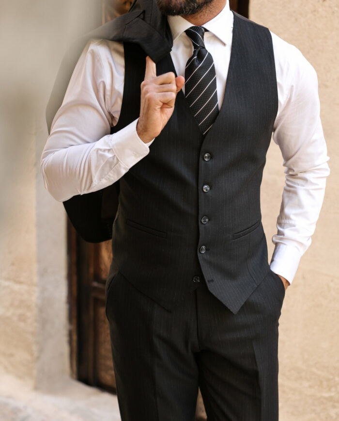 Aubert Road Slim fit all black pinstripe three piece men’s suit with peak lapels