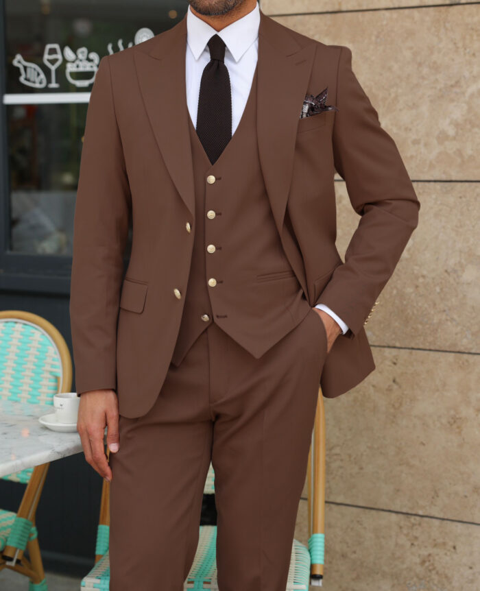 Tasker Road Slim fit chocolate coloured three piece men’s suit with a peak lapels With decorative gold buttons