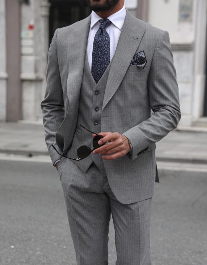 Reardon Street Slim fit light grey pinstripe three piece men’s suit with peak lapels