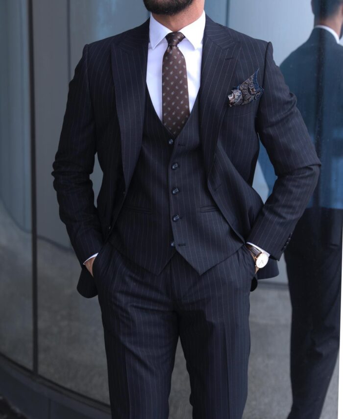 Cornwall Avenue Slim fit navy pinstripe men’s three piece suit with peak lapels